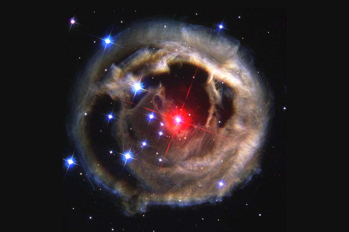 Red flash at the centre of dusty ring