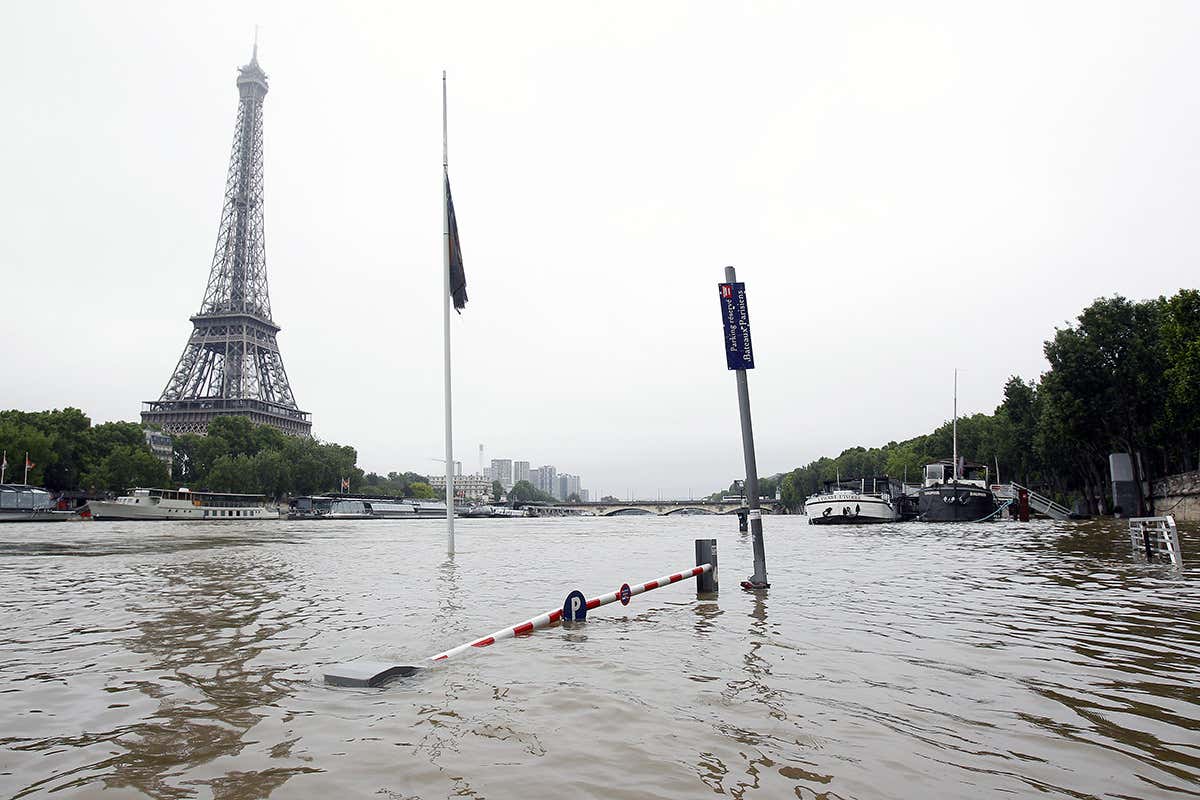 Flood waters surrounding the Eiffel tower