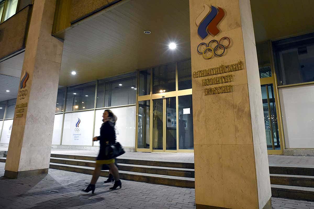 Women leave the Russian Olympic Committee building which houses the headquarters of the All-Russian Athletics Federation in Moscow