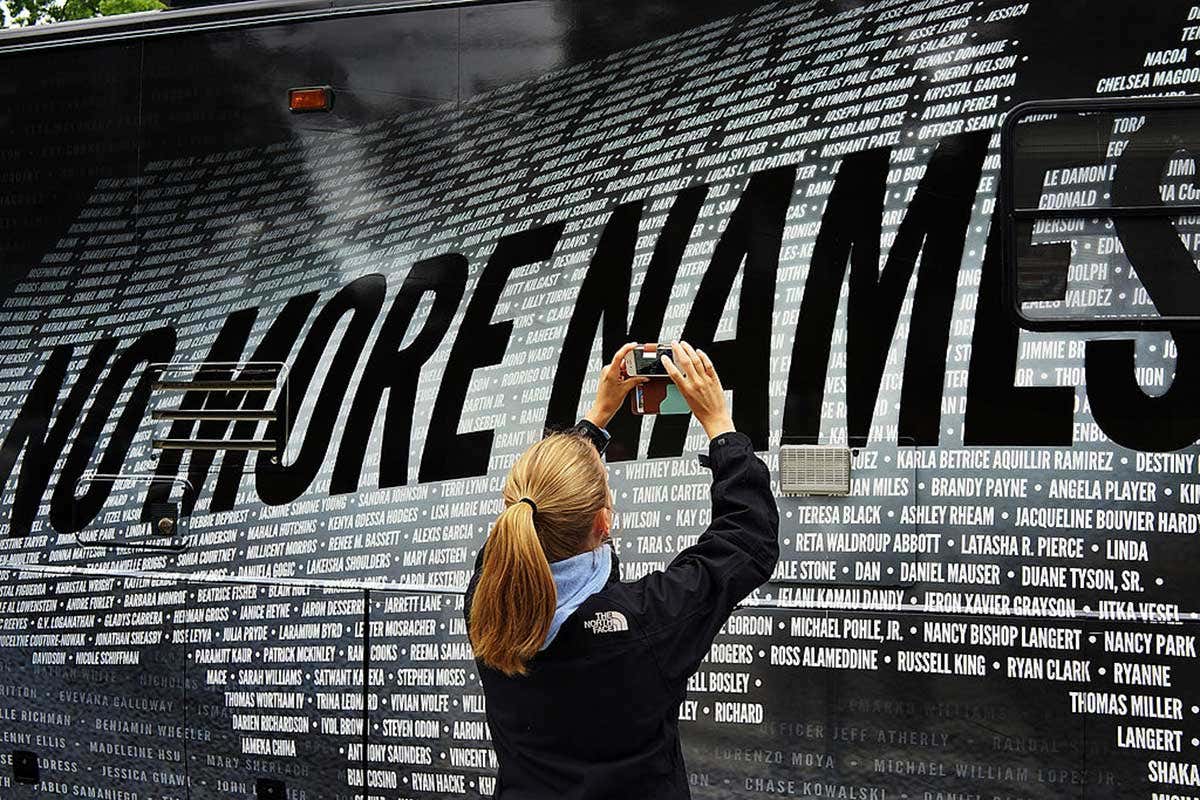 bus bearing some of the over 6,000 names of people killed by gun violence since the massacre in Newtown at a remembrance event on the six month anniversary of the massacre at Sandy Hook Elementary School