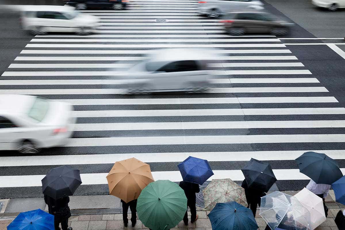 Pedestrians waiting at a crossing