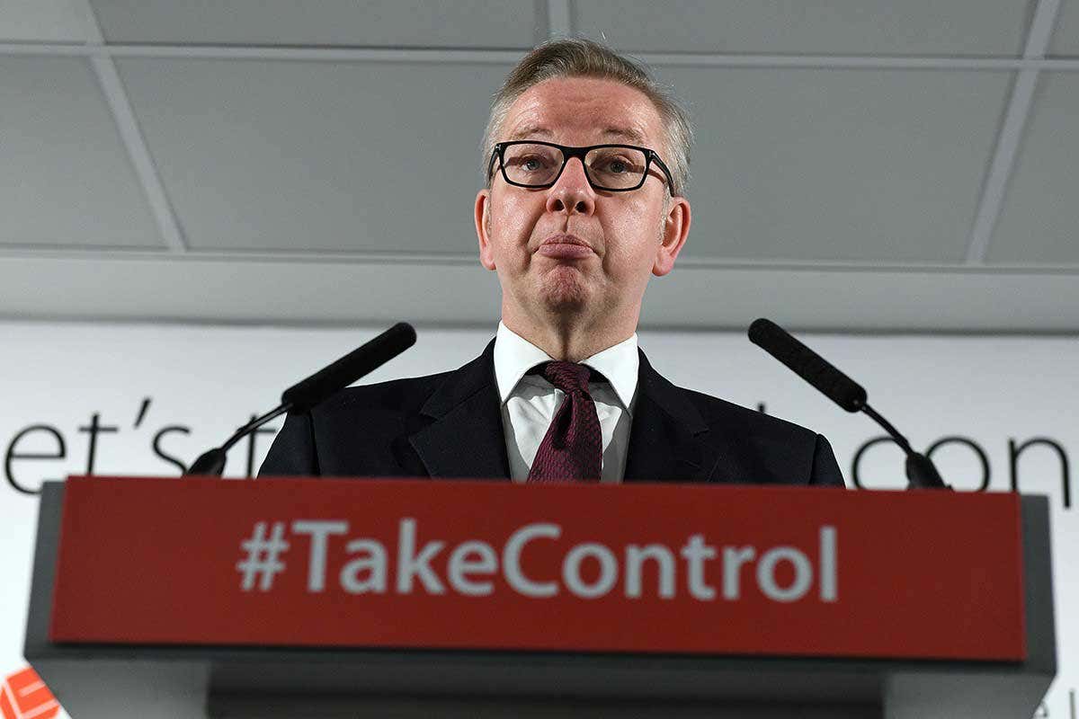 Michael Gove with the sign #TakeControl