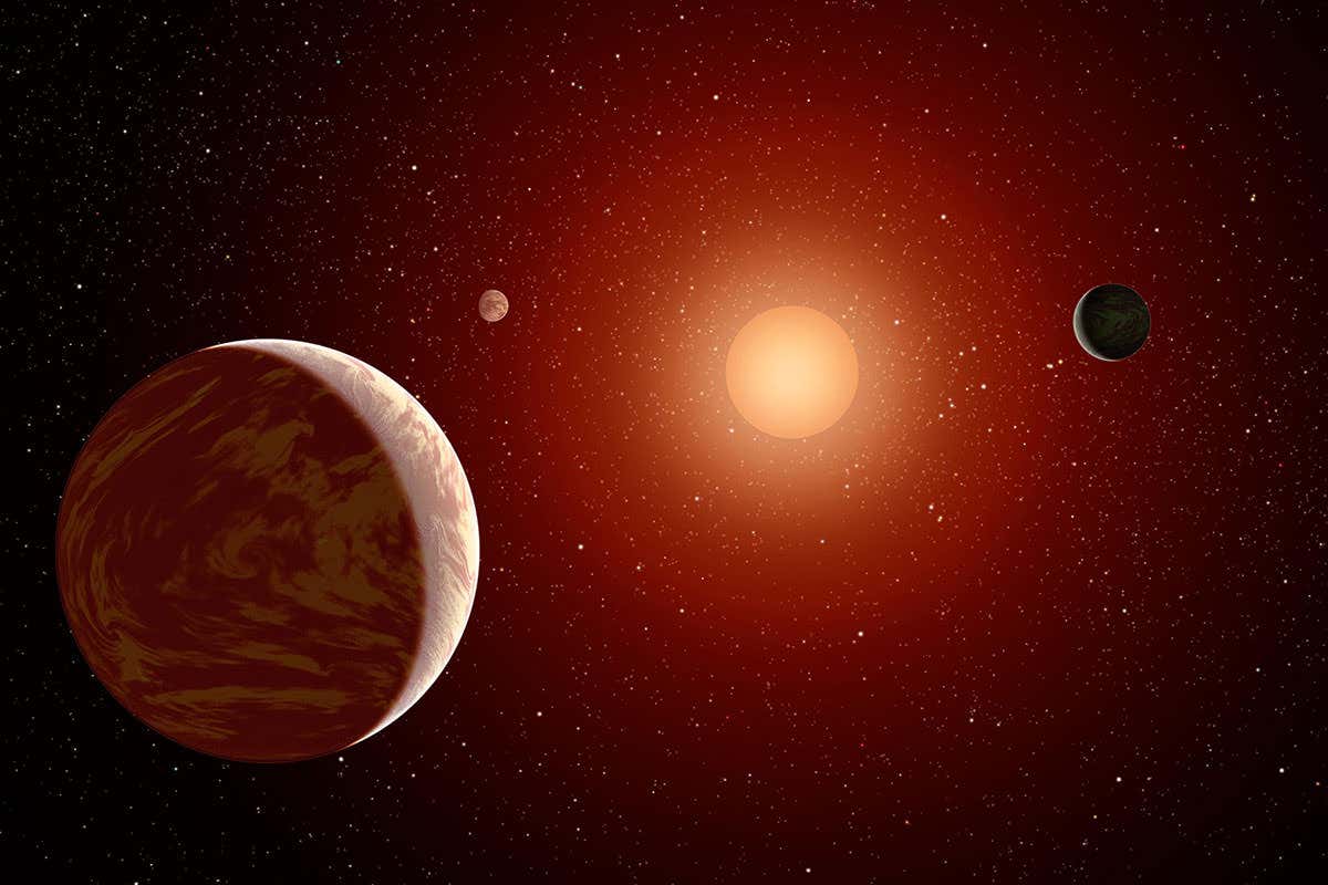 artist's impression of planets around a red dwarf star