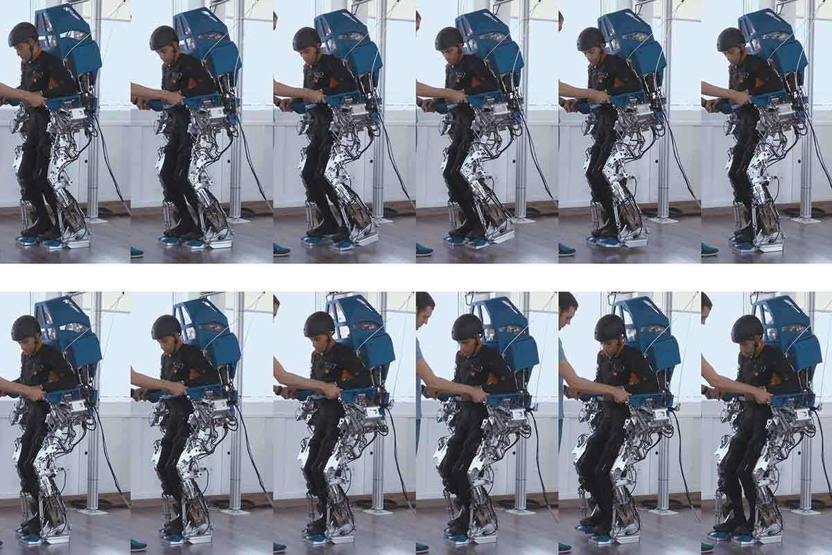 A paralysed man trains using apparatus that is connected to his brain