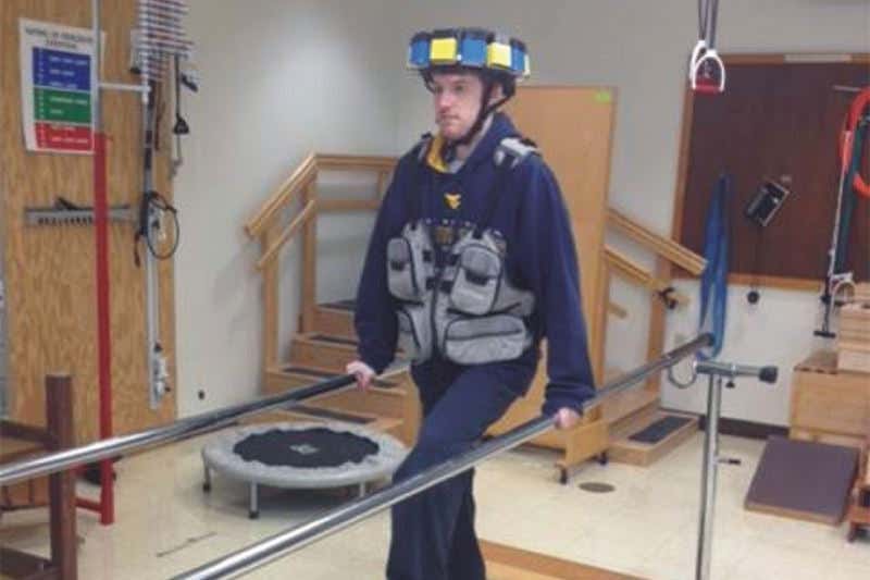 A man wearing a portable scanner