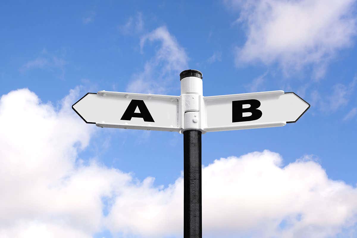 A and B sign post against a blue sky