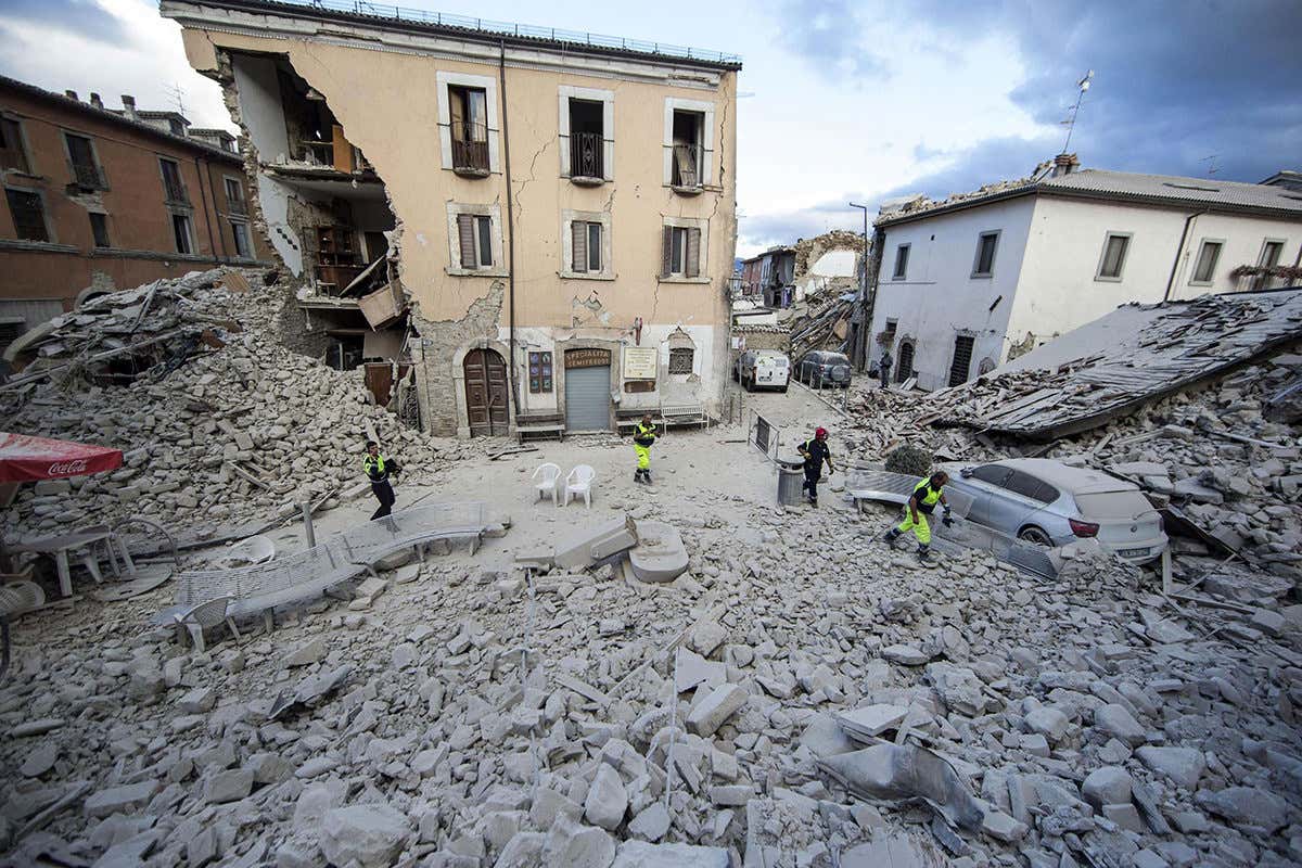 The side of a building collapsed in Amatrice following the magnitude 6 quake