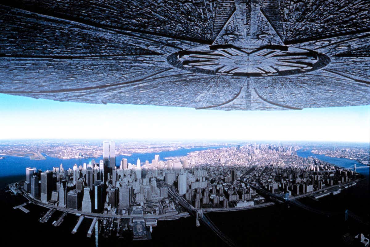 An alien spaceship over a city