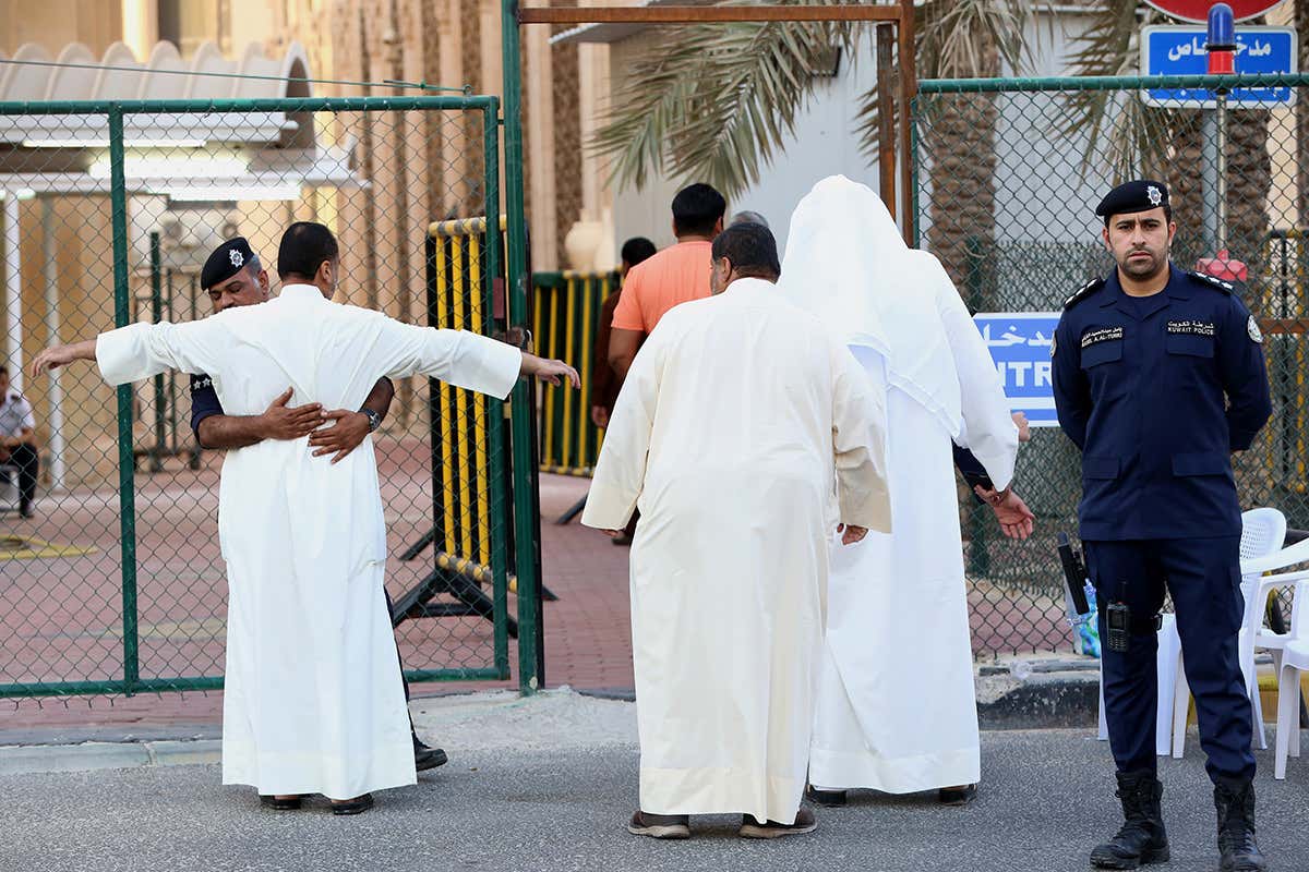 Security searches at a Kuwaiti mosque, September 2016