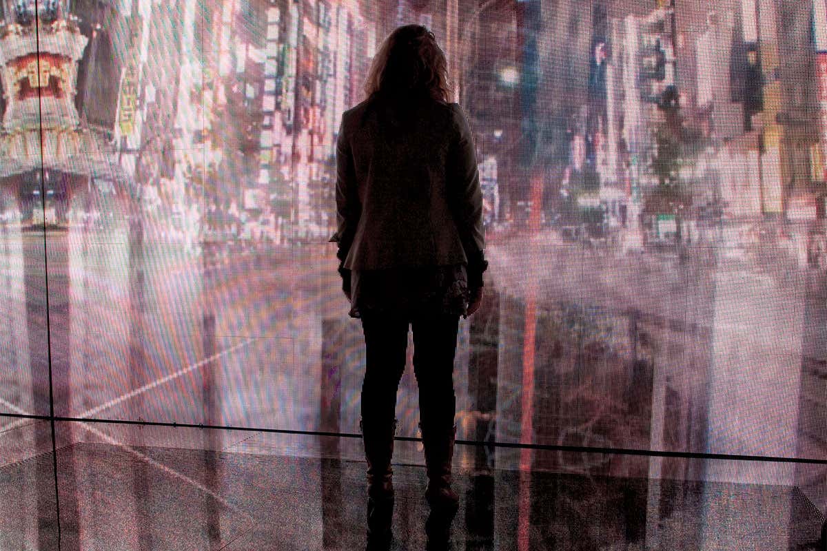 female staring at wall