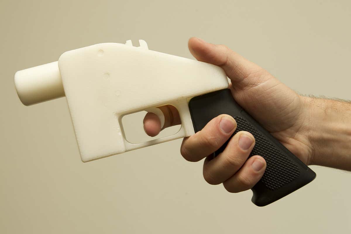 Am oddly shaped white plastic gun