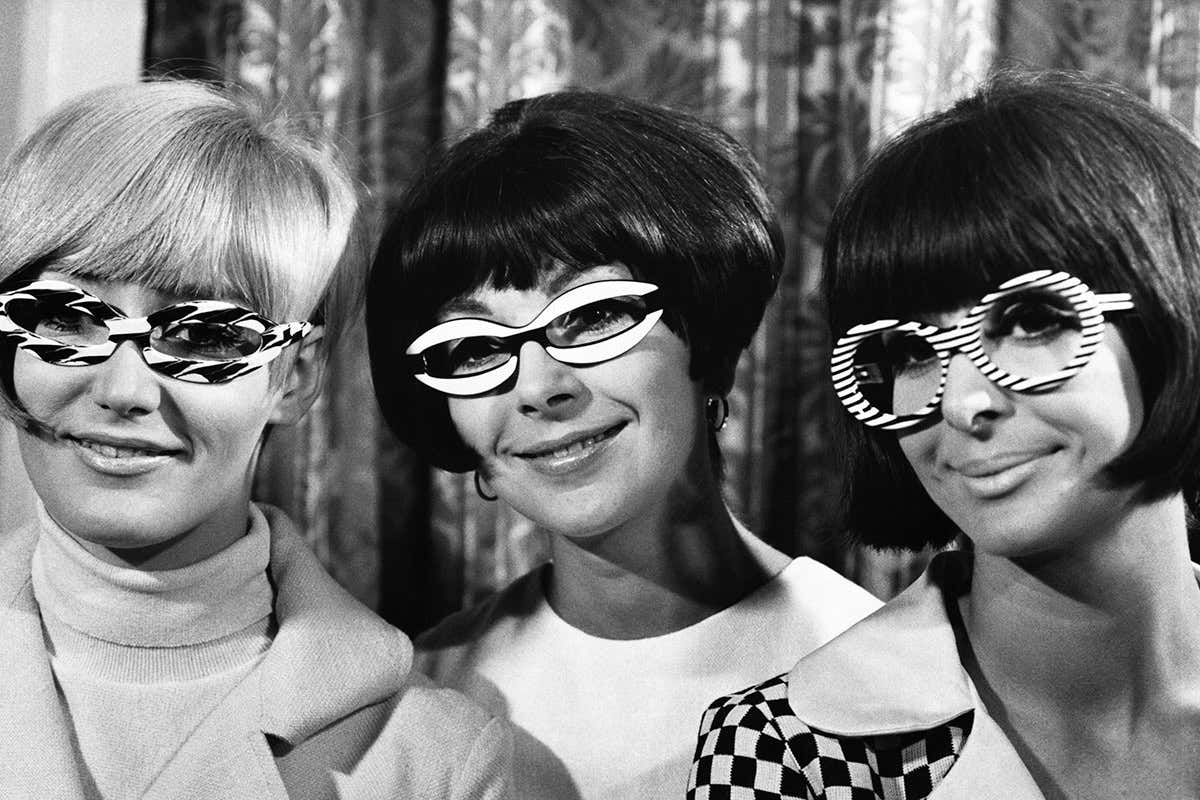 Three women wearing very large glasses