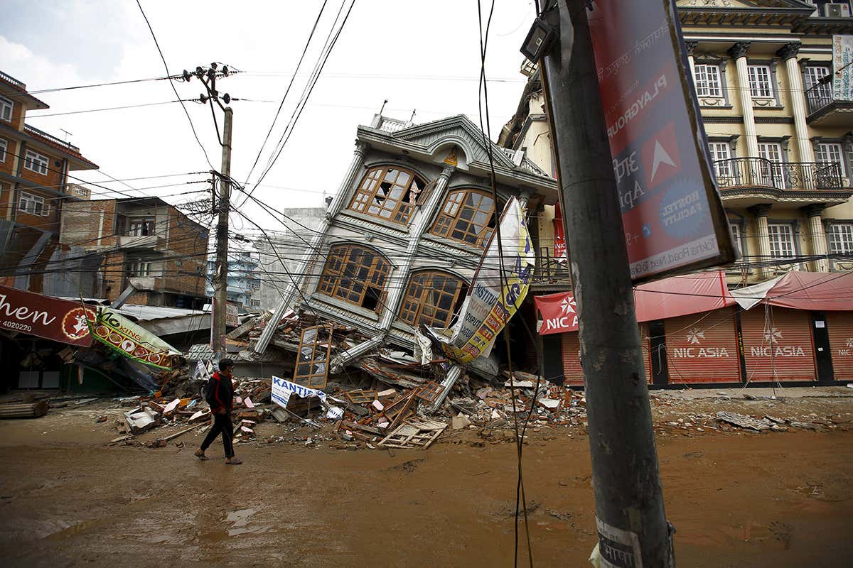 Aftermath of an earthquake in Nepal, showing a collapsed building