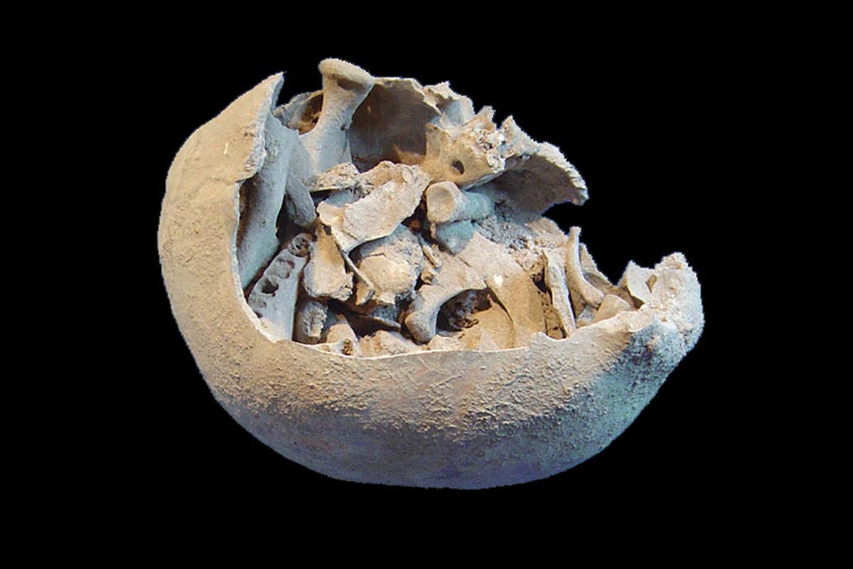 Skullcap containing bits of bone