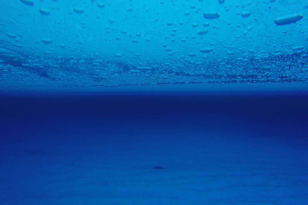 The surface ice of englacial lake 4m below the ice, show from underwater