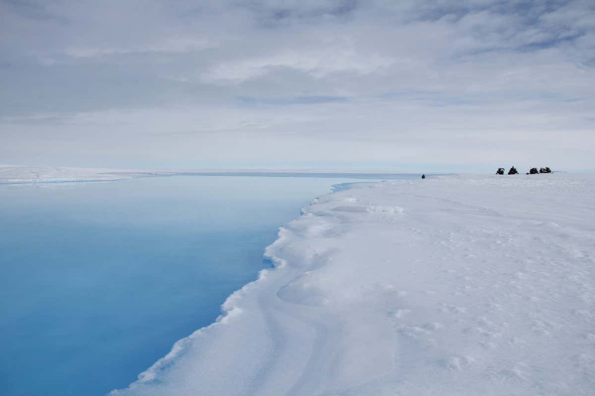 A stream flowing over the ice