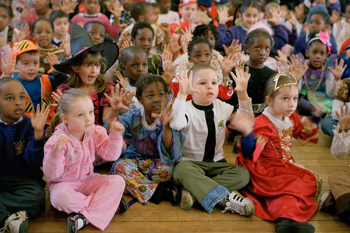 Children gathered together, some in costume