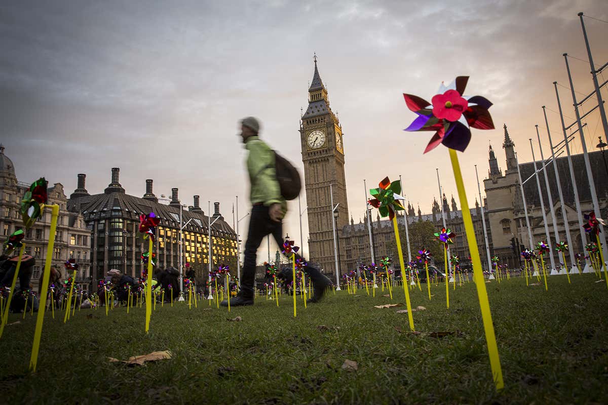 Man walks past UK parliament
