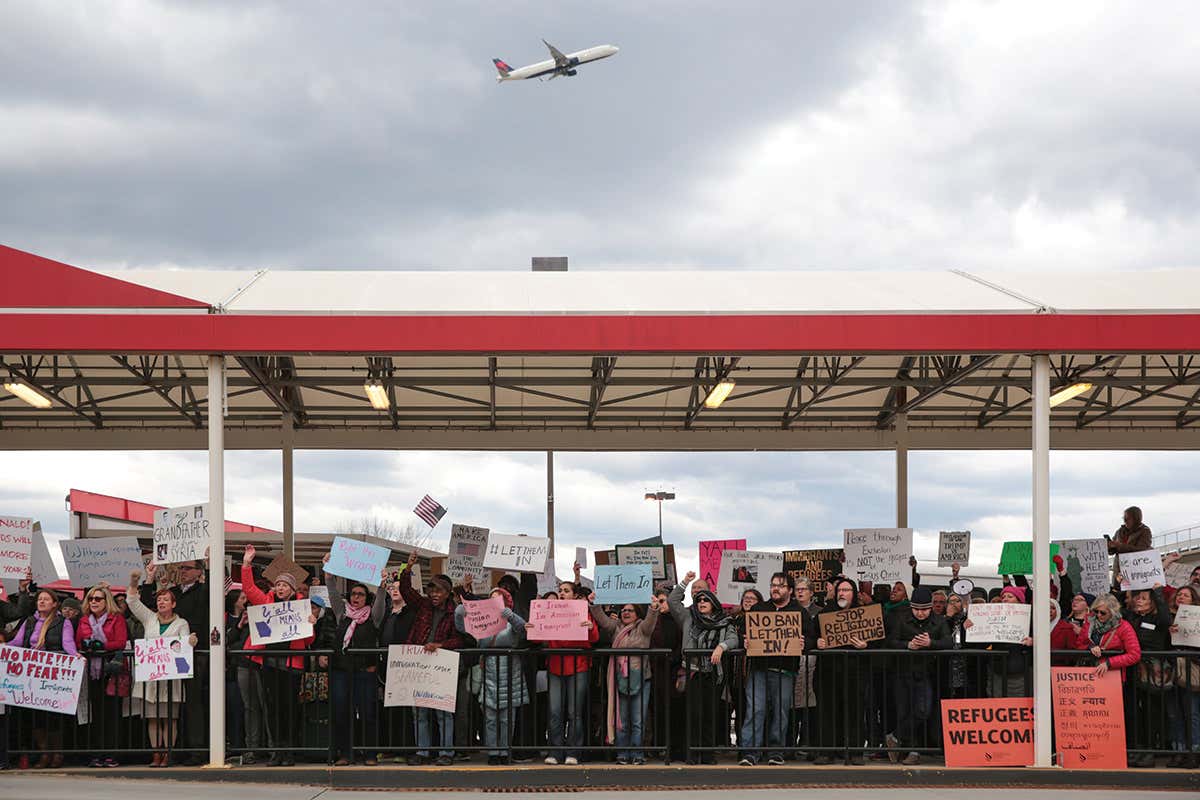 People protesting about the US ban on refugees