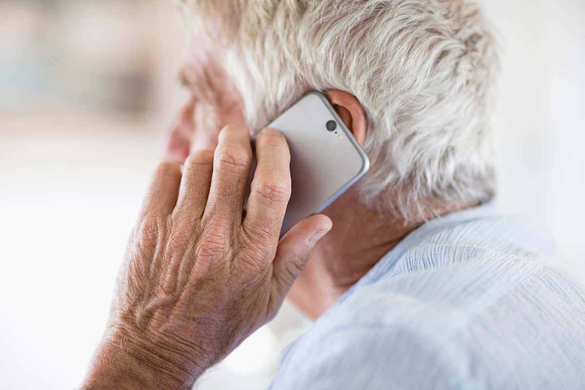 An old man on the phone