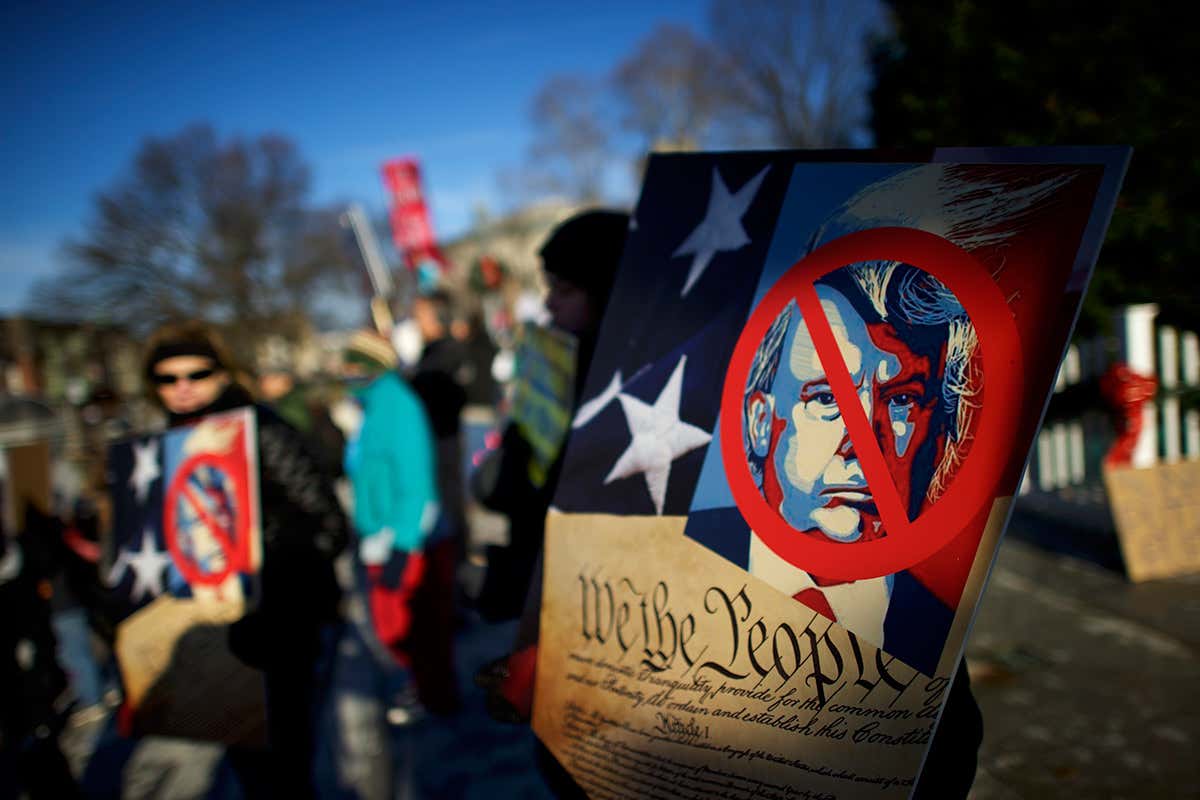 A banner saying Trump is unconstitutional