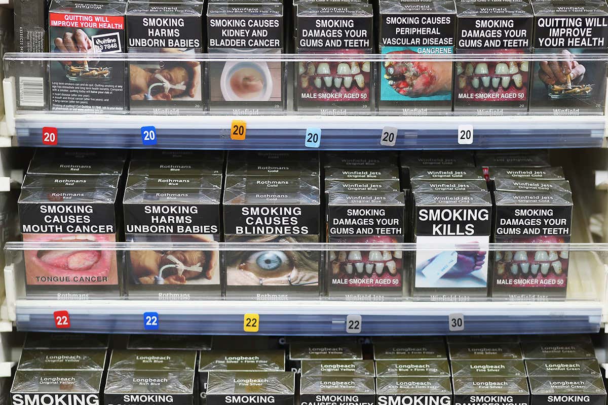 Shelf of cigarette packets