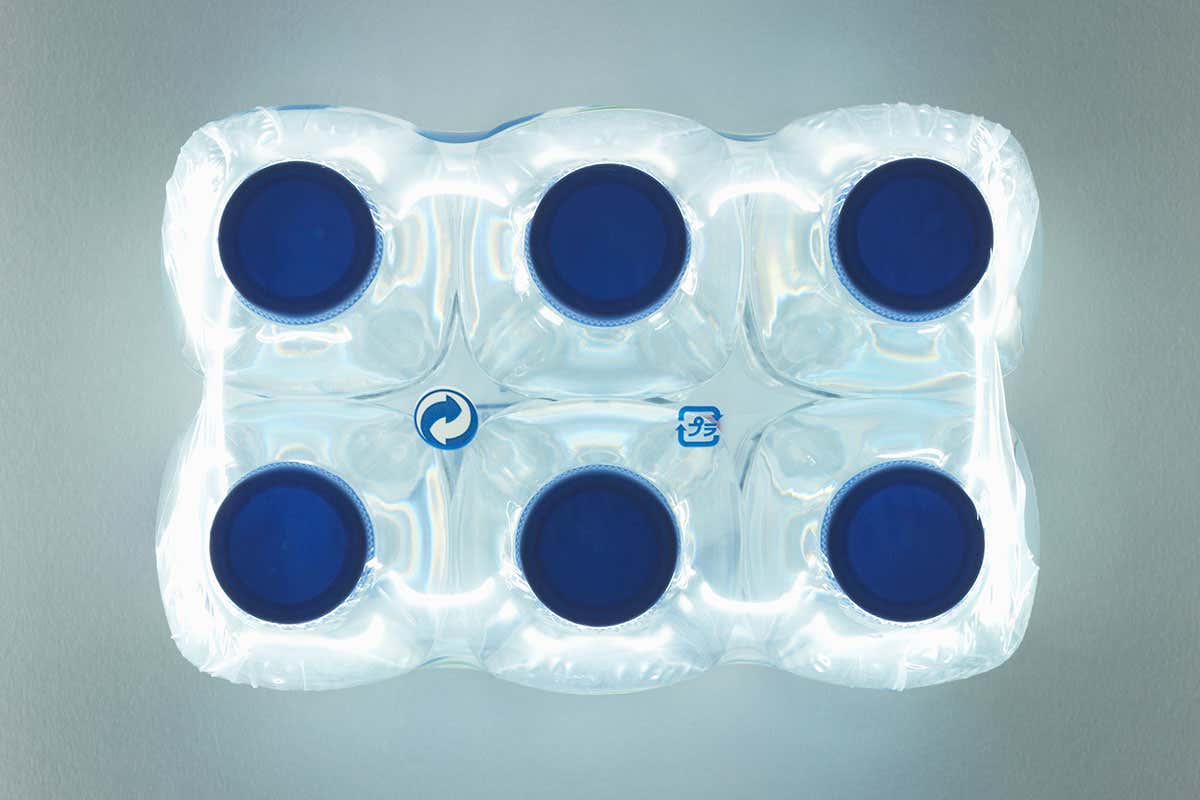 six water bottles shown from above