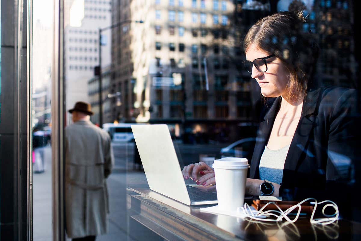 woman looking at a computer screen