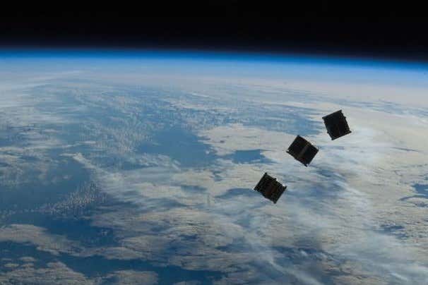 CubeSats being released in space