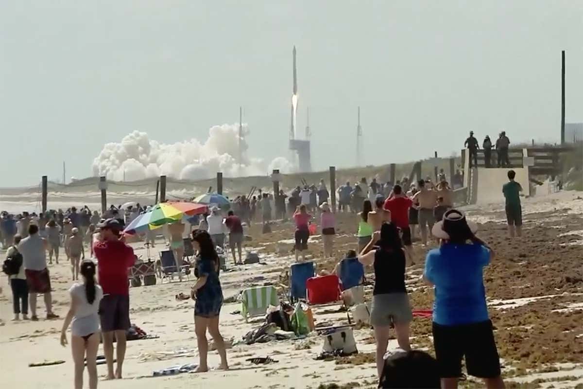 Crowd watches rocket launch at Cape Canaveral