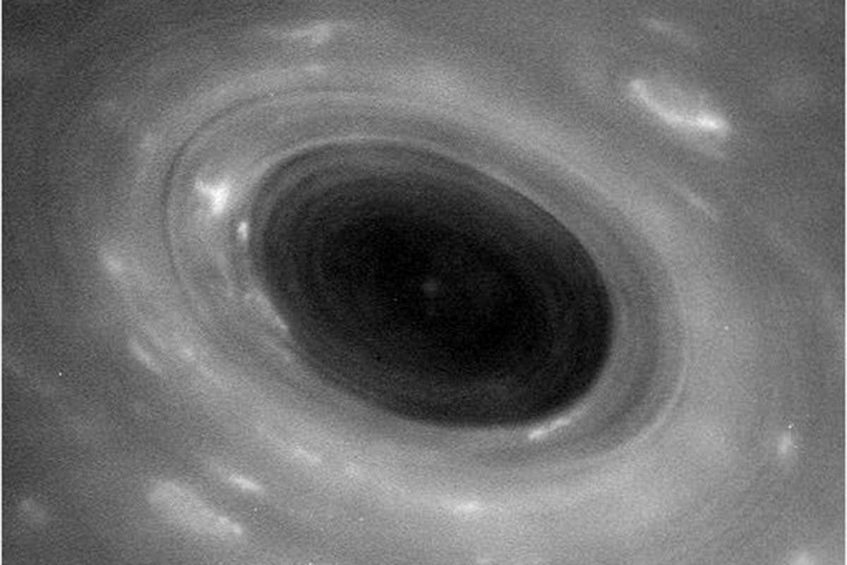 A swirling vortex over the planet's north pole