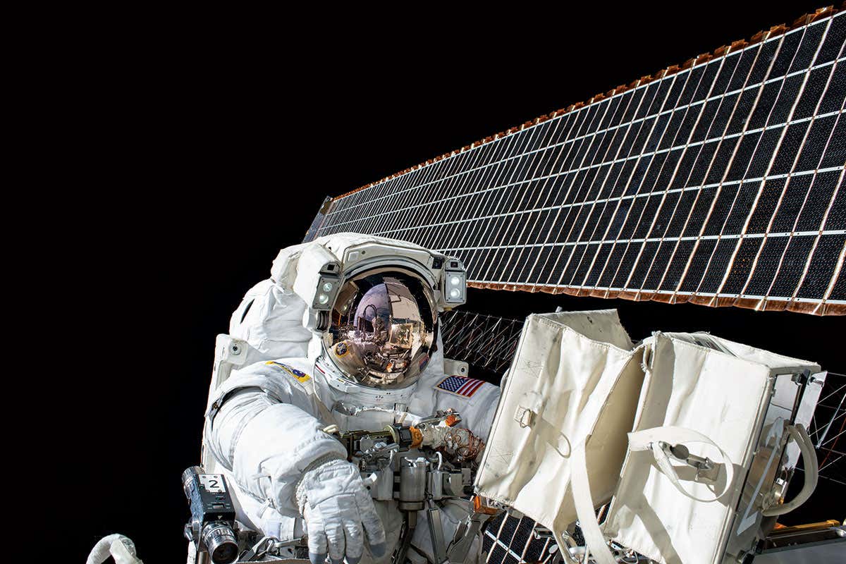 An astronaut in a spacesuit during a space walk
