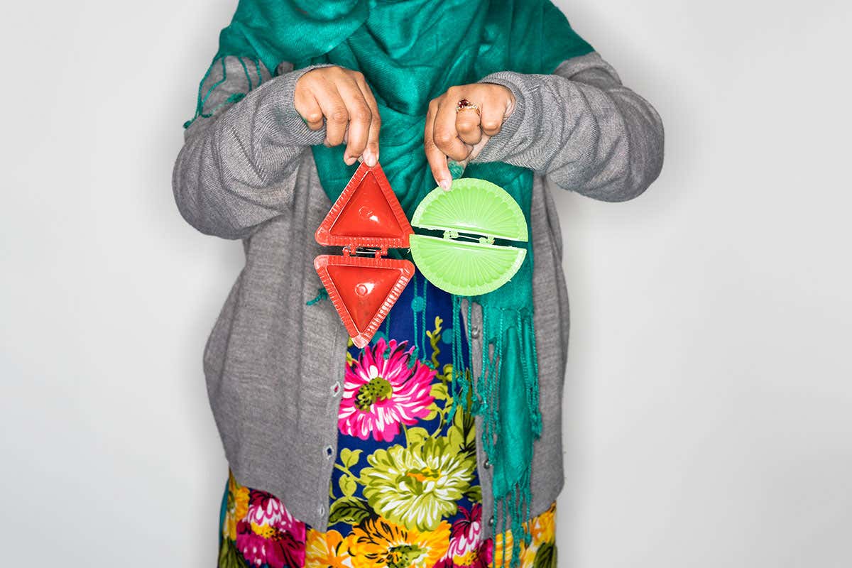 Woman holding objects