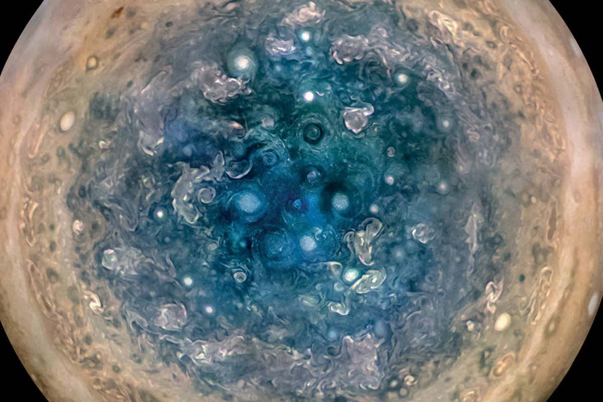 Amazing pictures show cyclones swirling above Jupiter’s poles