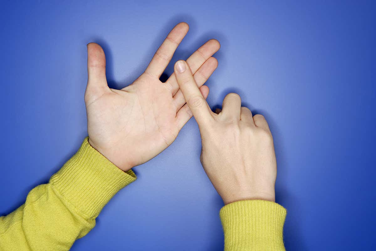 Woman's hands doing sign language