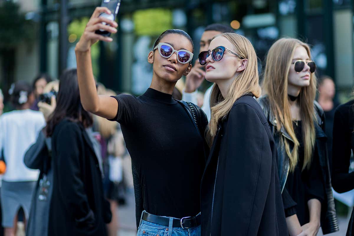 Two women posing for a selfie