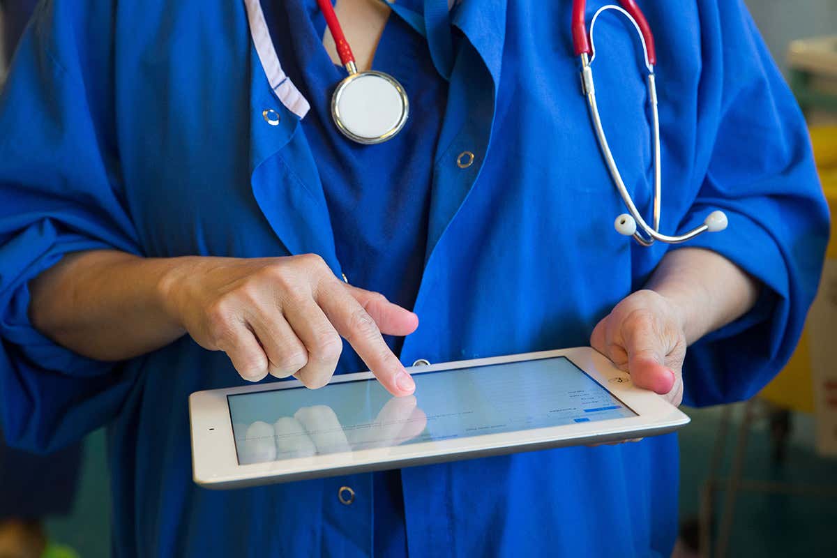 A medic with a iPad and stethoscope