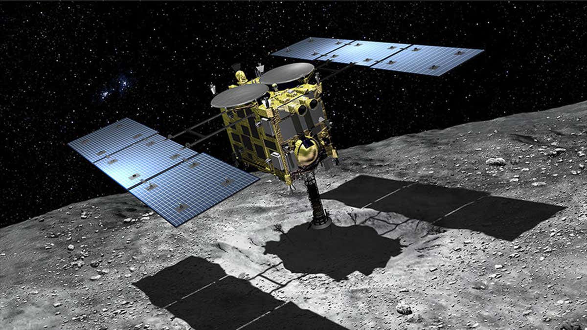 artist's impression of Hayabusa 2 collecting samples from a small crater blasted out of an asteroid