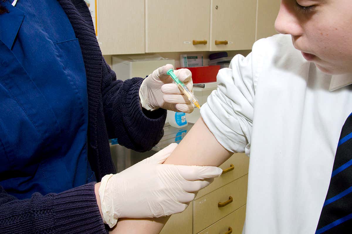 boy having the HPV vaccine