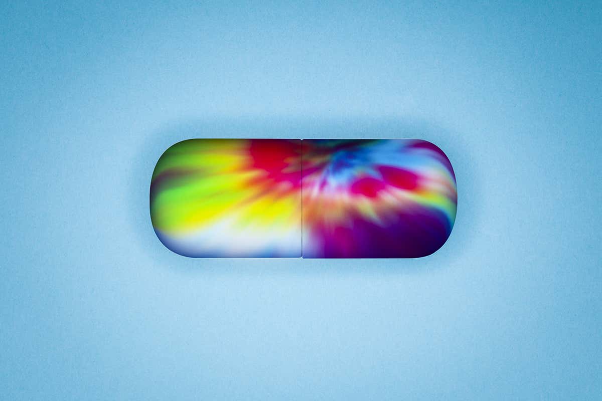 A multicoloured pill capsule