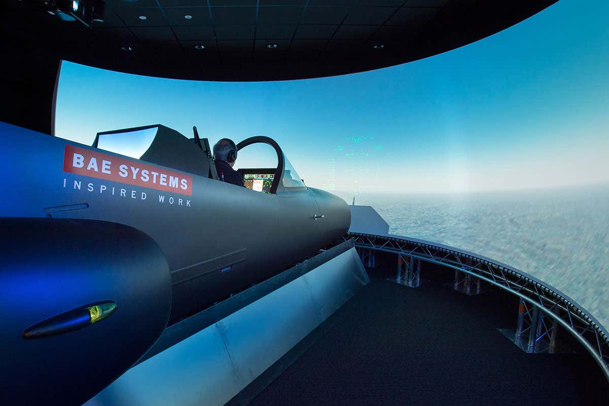 Mock cockpit with huge screen in front at BAE Systems