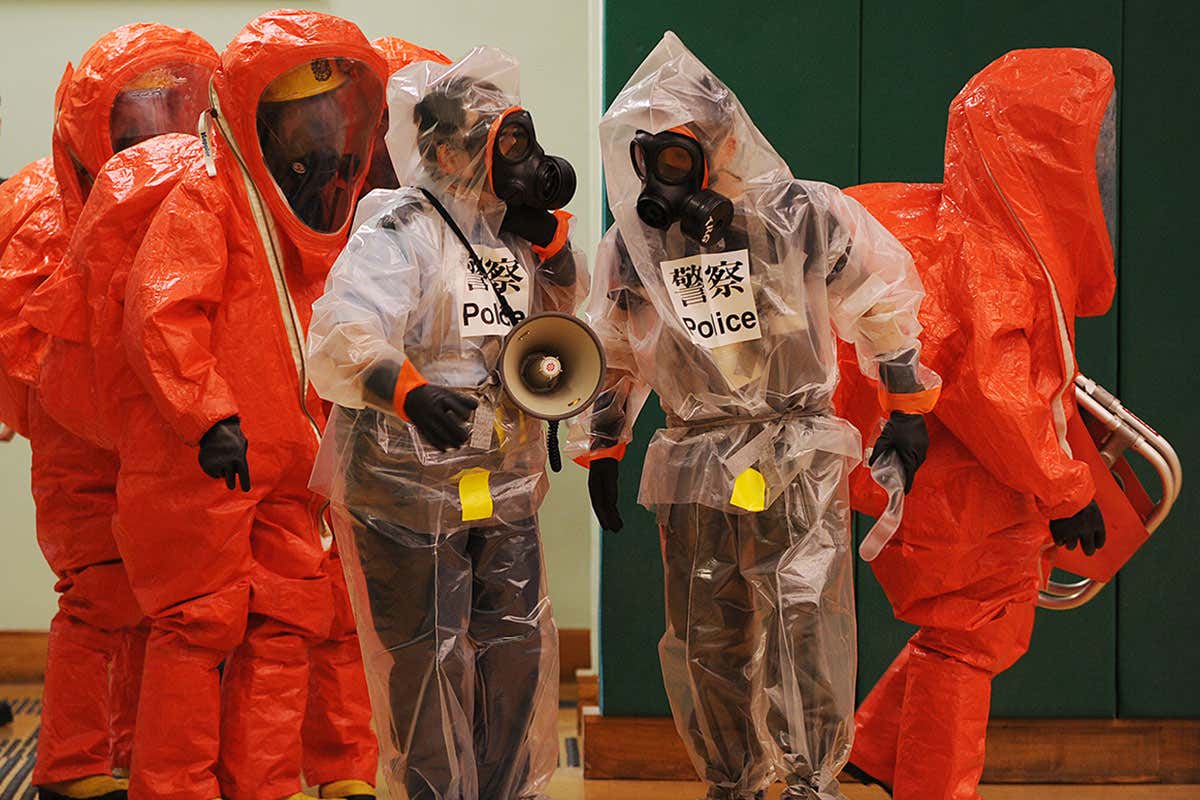 People in biosafety suits