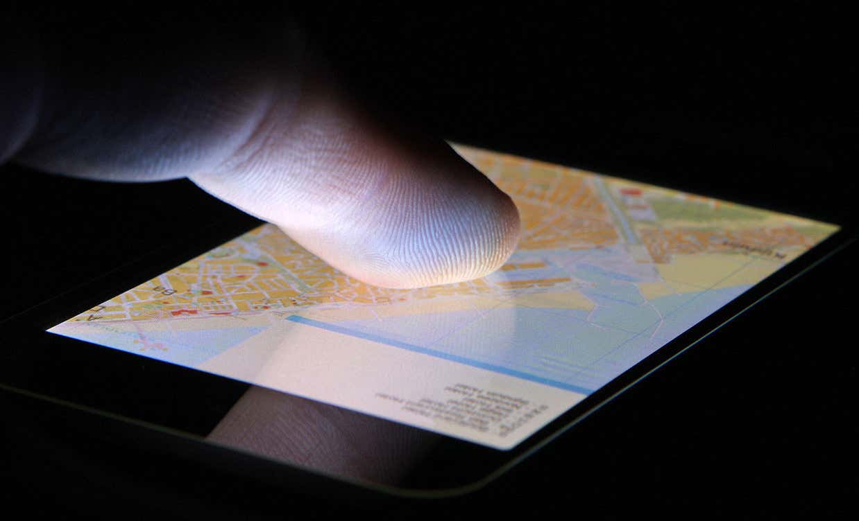 A finger on a touchscreen