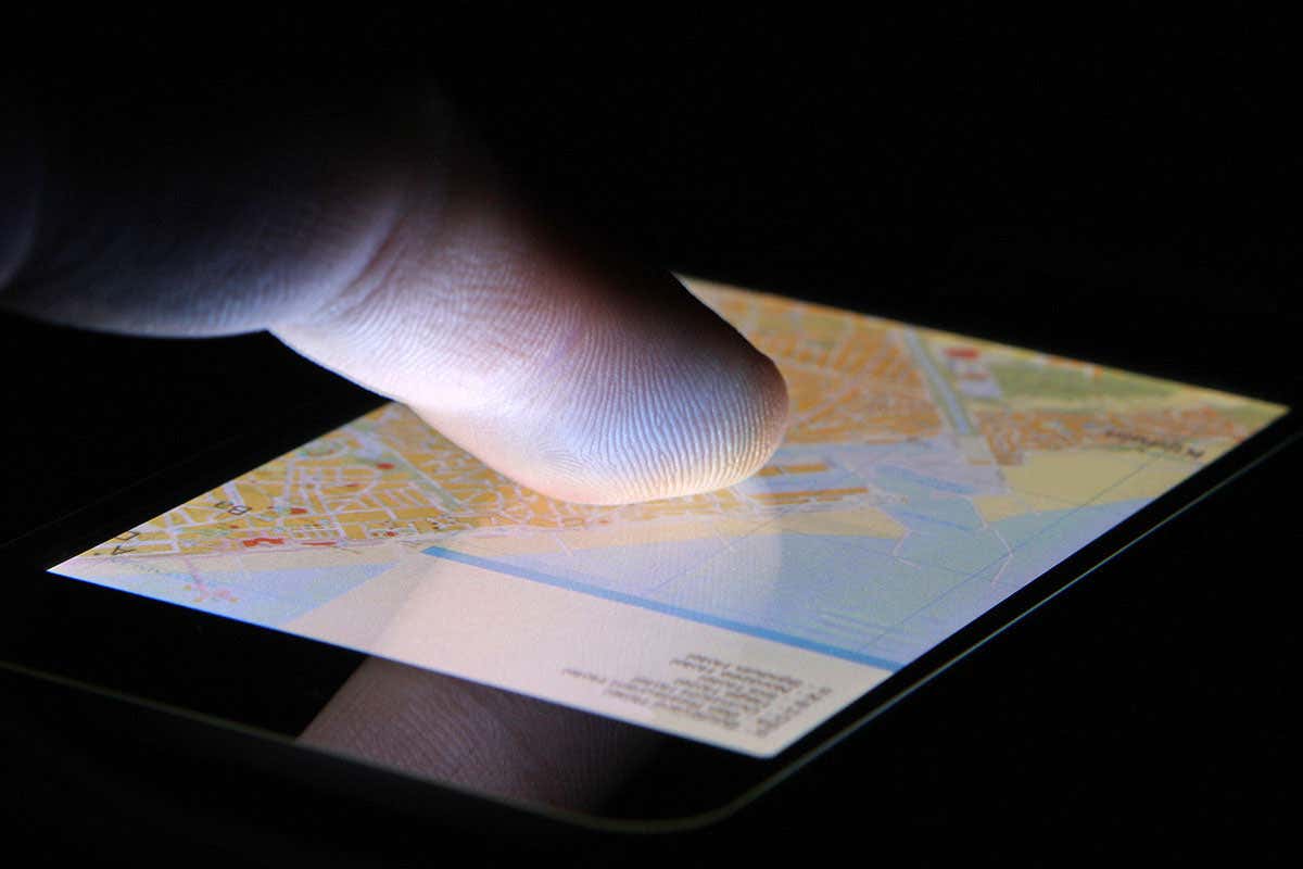 A finger on a touchscreen