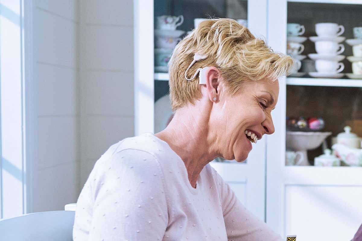 Woman with cochlear implant