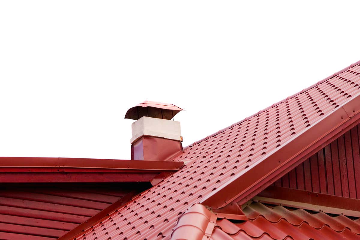Ordinary red roof tiles against a white sky