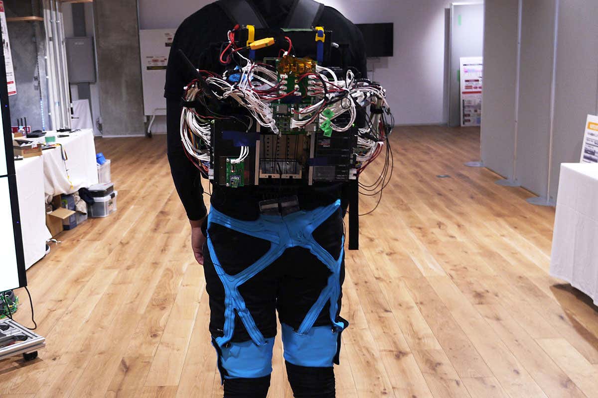 The body suit and pack designed at Panasonic Research