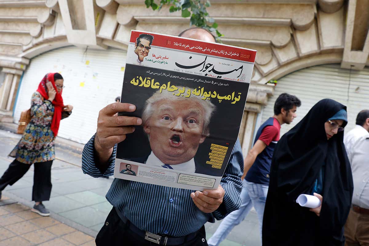 Front cover of Iranian newspaper reporting Trump's decision