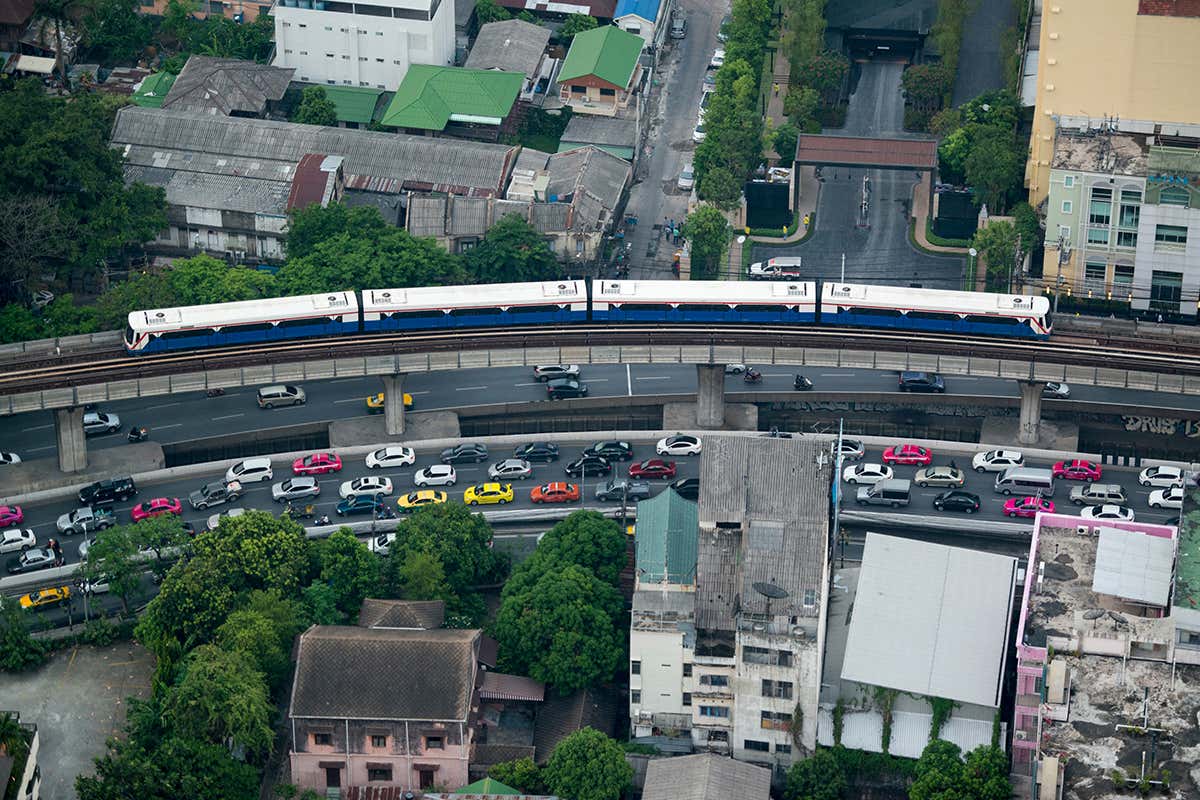 Aerial view of streets and elevated metro line