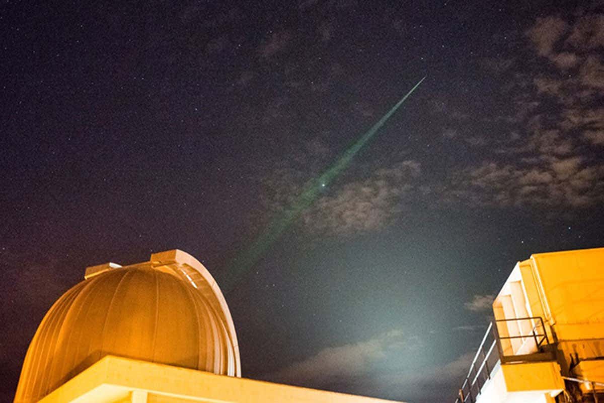 Beam pointing skywards from observatory